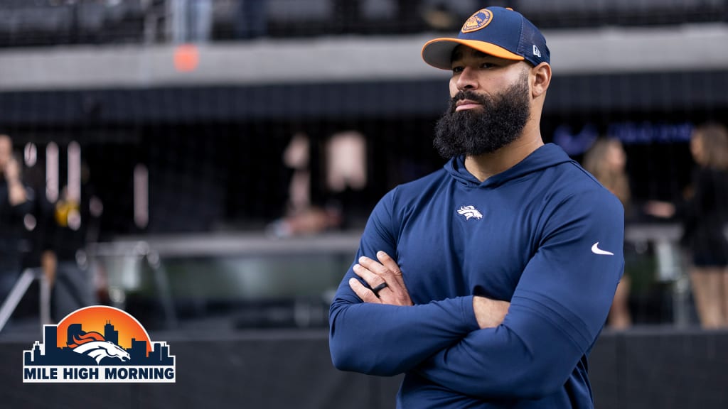 Denver Broncos coach Michael Wilhoite on the sideline in team attire