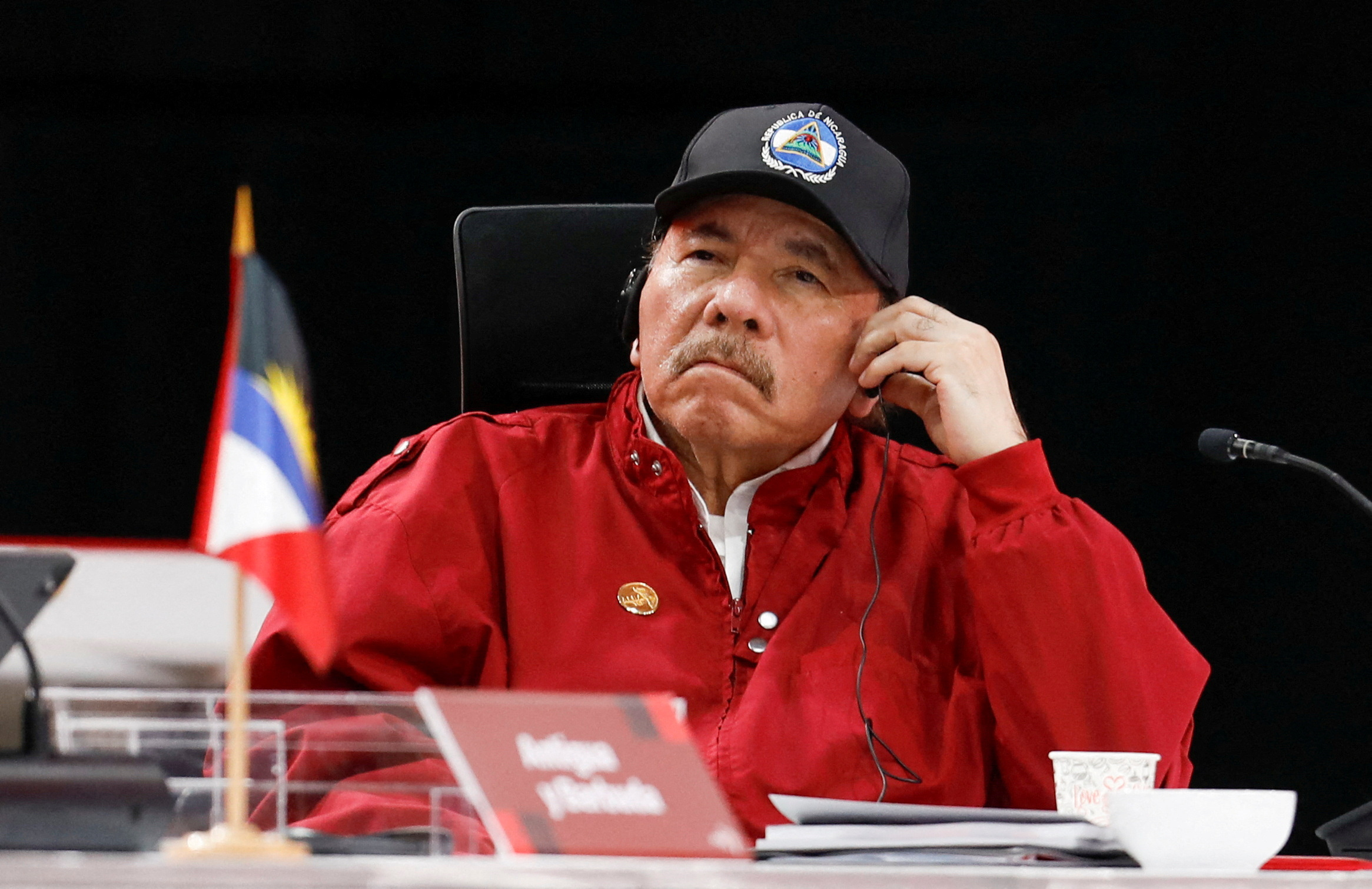 Daniel Ortega at a podium in Managua during the announcement that Nicaragua would no longer hold elections