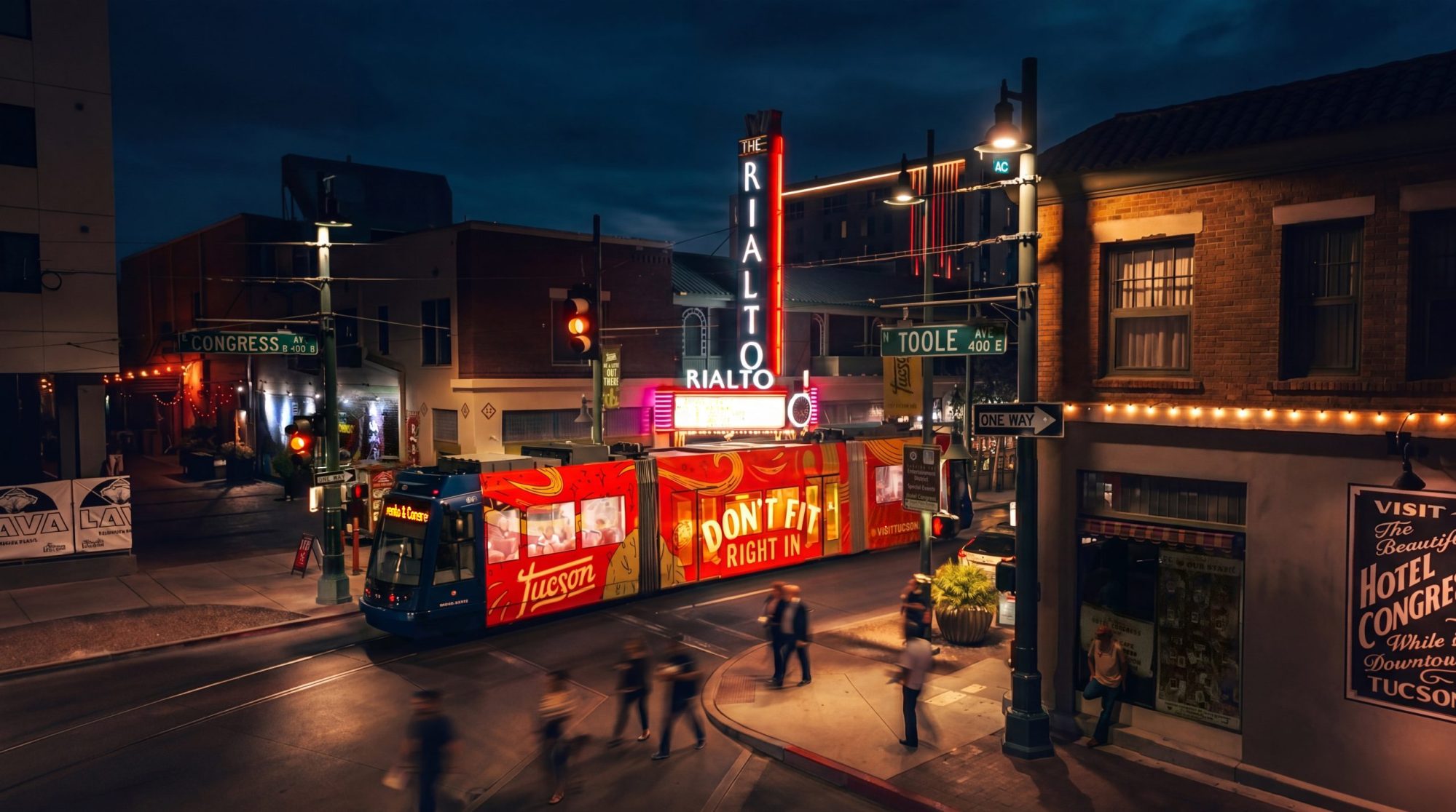 Nighttime view of Congress Street in downtown Tucson near 6th Avenue and the Rialto Theatre marquee