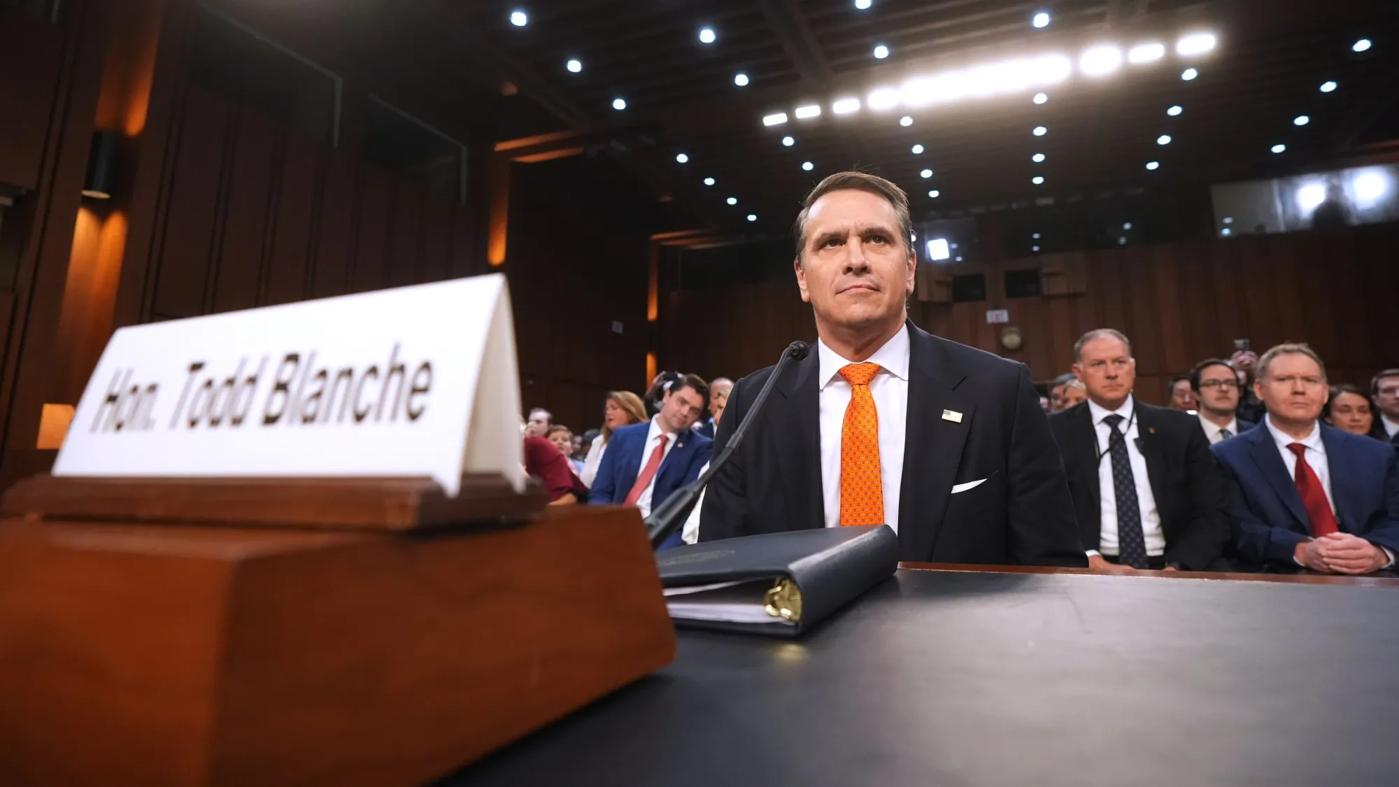 Todd Blanche testifying before the Senate Judiciary Committee from a witness table microphone