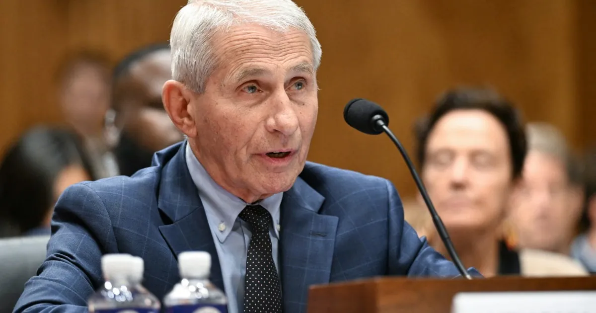 Dr. Anthony Fauci seated at a Senate hearing witness table during the July 2026 COVID-19 hearing