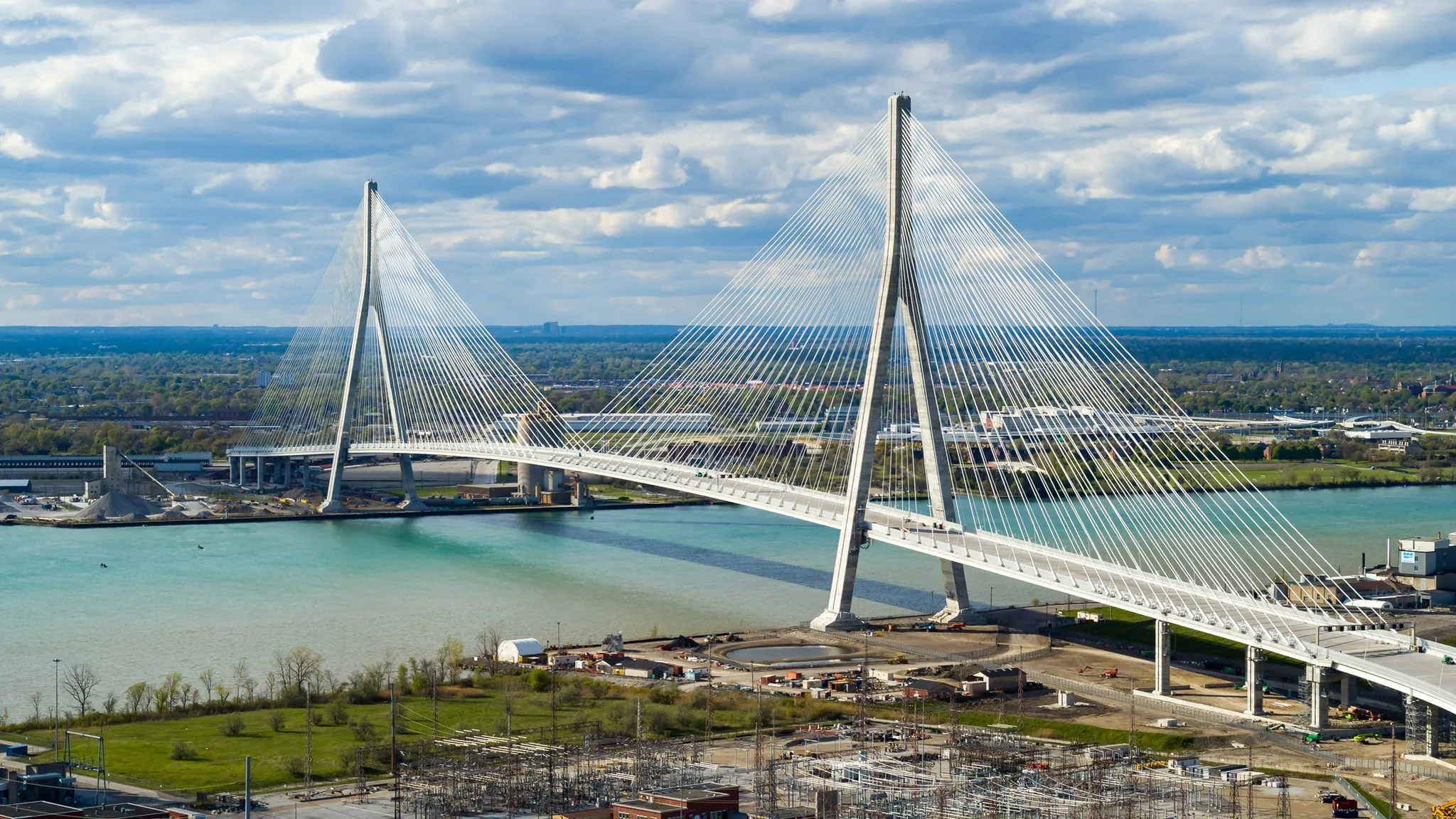 The newly opened Gordie Howe International Bridge spanning the Detroit River with its cable-stayed deck and two towers