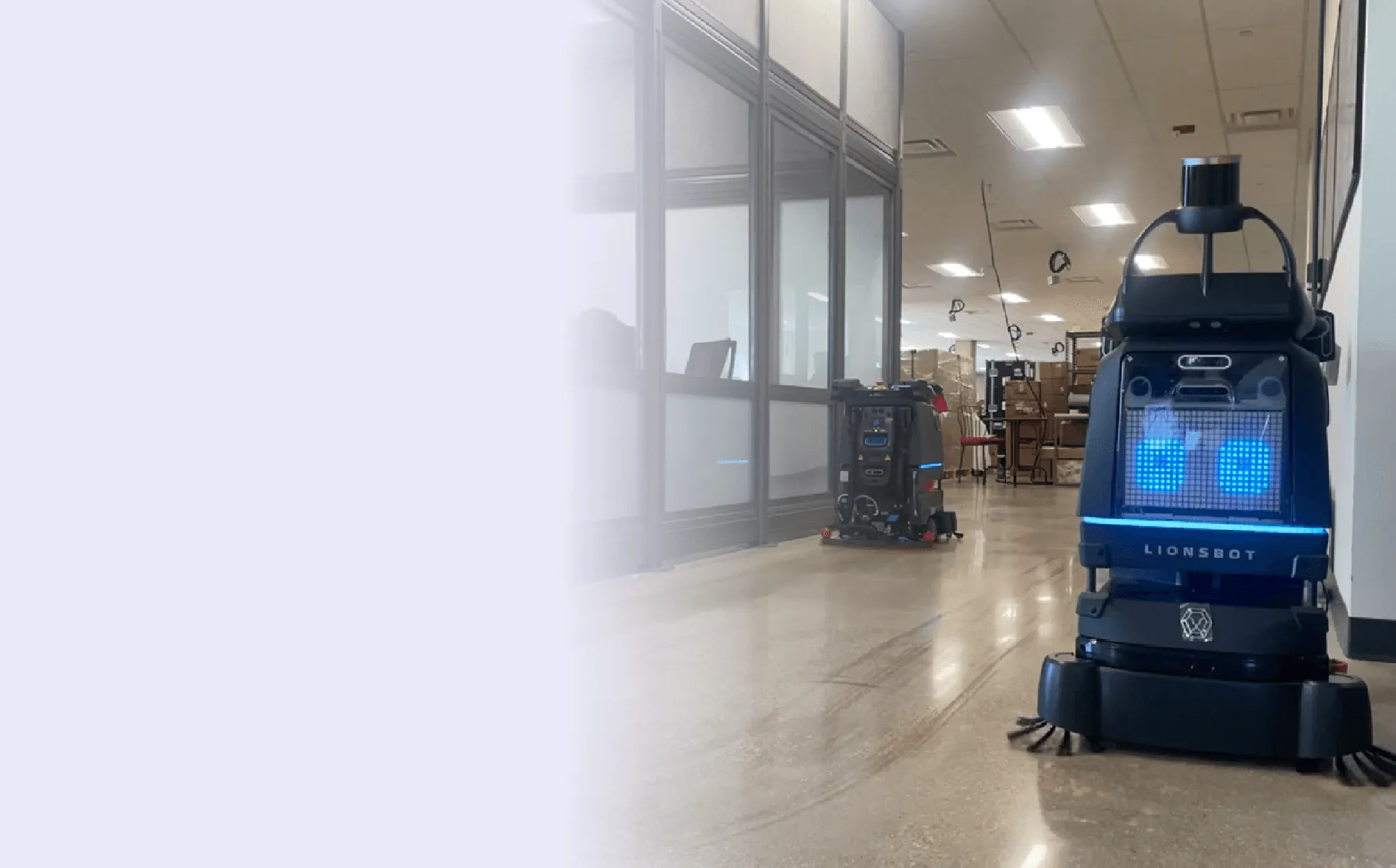Commercial floor-cleaning robots in a commercial interior