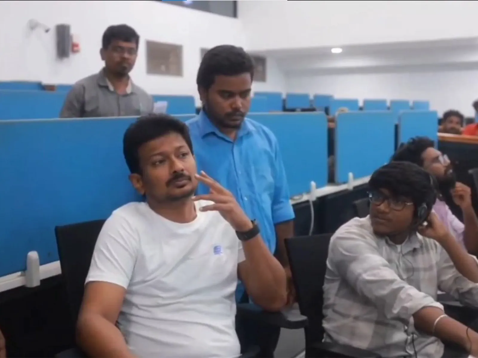Udhayanidhi Stalin at the Greater Chennai Corporation Command and Control Centre with monitors visible behind him