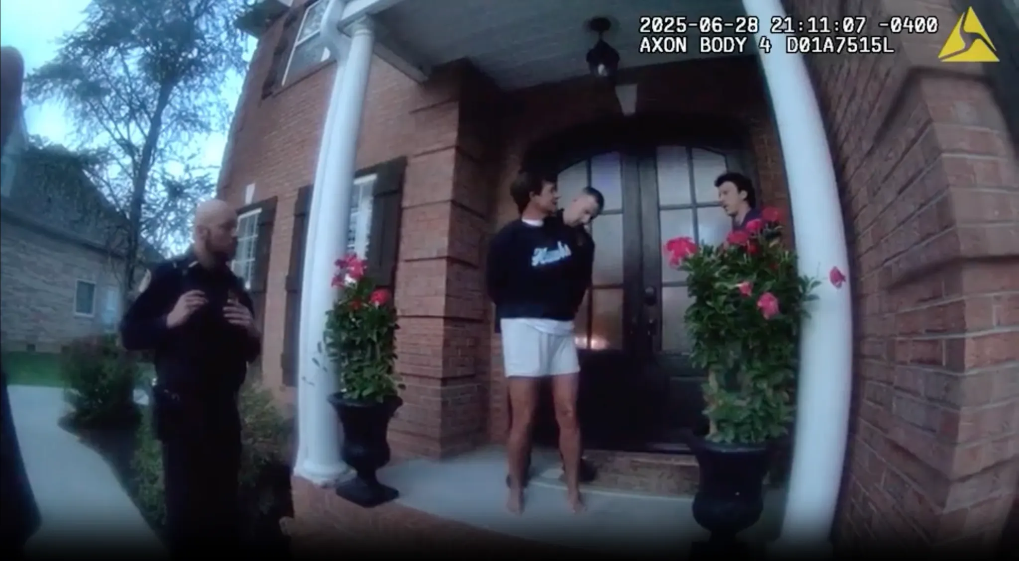 Donna Dillon arrest at her front door with Knox County deputies and a camera crew visible at night