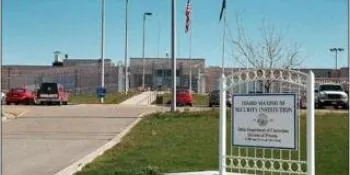 Exterior of Idaho Maximum Security Institution with fencing and guard towers