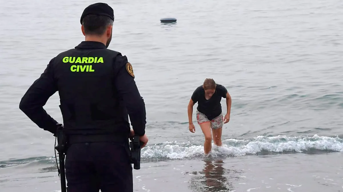 People swimming along the Ceuta coastline during an attempted entry by water