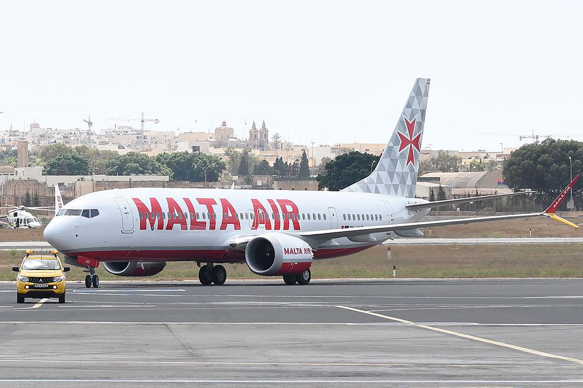Malta Air Boeing 737-800 parked on an airport tarmac in daylight