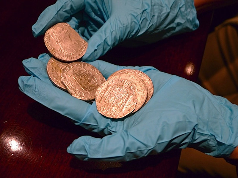 Silver and gold coins recovered from the Nuestra Senora de las Mercedes shipwreck