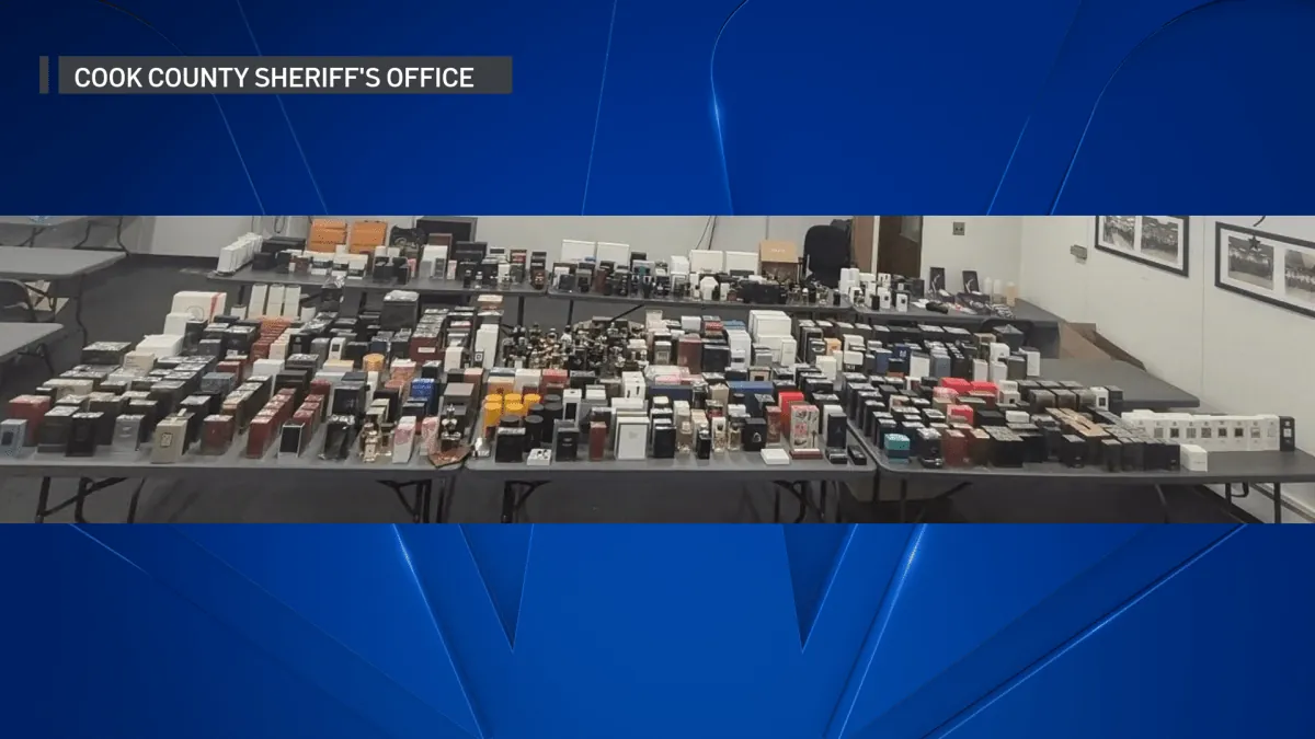 Rows of seized luxury fragrance bottles displayed as evidence in the Philip Carter investigation