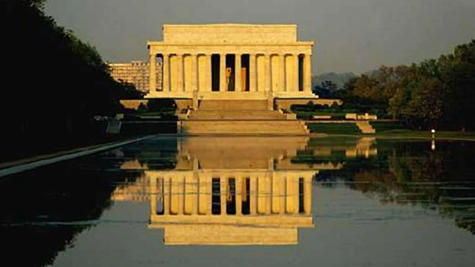 Lincoln Memorial Reflecting Pool stretching toward the Lincoln Memorial under a bright sky